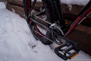 E.13 cranks and a Sram X0 type-2 rear derailleur keep things light and high-performance.  The platform pedals are ideal for boots.