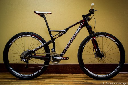 The frame of the Epic has been completely redesigned for 2014. Note the taller chain stays and redesigned top tube. A front thru-axle has been added, as well.