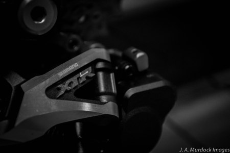 A Shimano XTR Shadow + rear derailleur shifts precisely and almost instantly, all while reducing noise and dropped change.