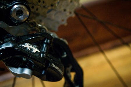A Shimano XT rear derailleur keeps shifts quick and exact.